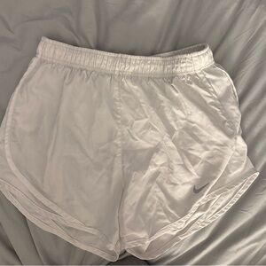 White Nike shorts